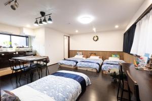 Postel nebo postele na pokoji v ubytování 恐竜博物館まで車で5分 自然体験 古来農業体験ができる一棟貸し宿Dinosaur Agri