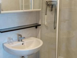 a bathroom with a sink and a shower at Appartement Les Adrets-Prapoutel, 2 pièces, 5 personnes - FR-1-771-32 in Les Adrets
