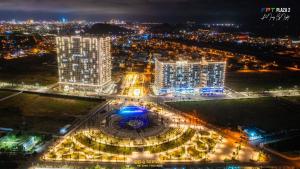 an aerial view of a city at night at FPT Plaza 2 in Danang