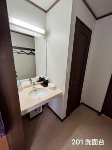 Postel nebo postele na pokoji v ubytování 冠京ホテル