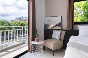 Balkón nebo terasa v ubytování SD Residence I Naiyang Beach I HKT Airport + 32 fotografií