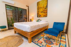 Voodi või voodid majutusasutuse Hacienda La Norma Boho Boutique Hotel toas