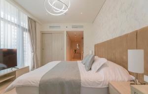 Postel nebo postele na pokoji v ubytování Studio with private beach access at Palm Jumeirah