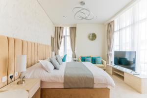 Postel nebo postele na pokoji v ubytování Studio with private beach access at Palm Jumeirah