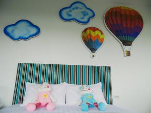 Postel nebo postele na pokoji v ubytování Footprint Garden B&B