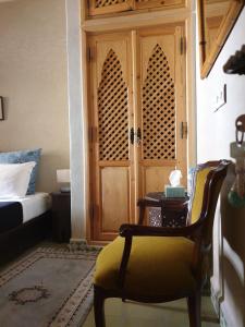Letto o letti in una camera di Dar Sami, Riad Bab Kasbah