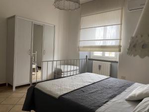 Postel nebo postele na pokoji v ubytování Maison Huguette