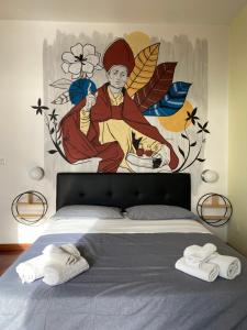 A bed or beds in a room at NAPOLI MOOD Il Golfo Apartments