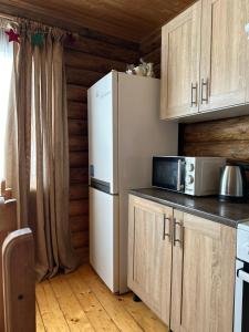 Kuchyň nebo kuchyňský kout v ubytování Cottage Marko