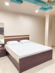 Lova arba lovos apgyvendinimo įstaigoje Hotel City View Bhubaneswar