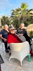 a group of people sitting in a chair at Barocchetto Romano in Lido di Ostia