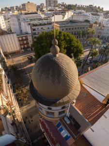 an overhead view of a building with a dome at Conjunto de APARTAMENTOS ANTIGUO PALACIO HOTEL PARIS in Huelva