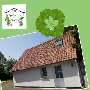 a leaf clover on a roof of a house at A l'ombre du ginkgo in Campagne-lès-Hesdin