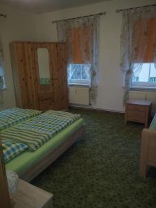 Postel nebo postele na pokoji v ubytování Hotel Stadt Leipzig
