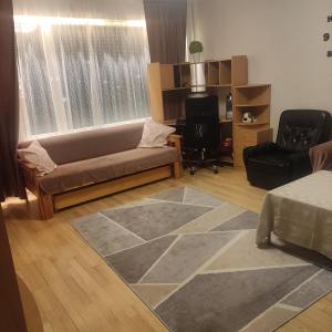 Гостиная зона в HILLAPOLUN 3 rooms APARTMENS Rovaniemi