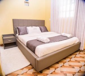 Ένα ή περισσότερα κρεβάτια σε δωμάτιο στο Havana Cottages -Telaviv