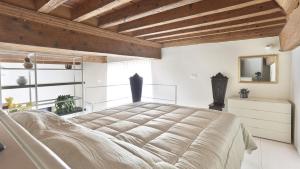 เตียงในห้องที่ Miranda al Palazzo Dipinto