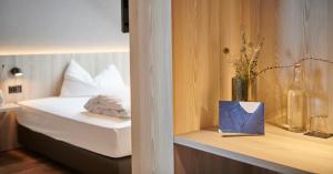 Postel nebo postele na pokoji v ubytování Hotel Balga Natur- und Bikehotel