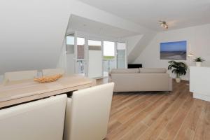 Posezení v ubytování Ferienwohnung Inselstern - Residenz an der Nordseetherme