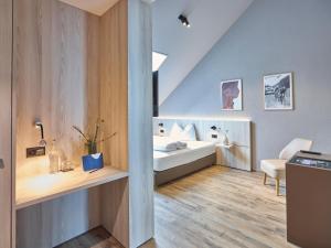 Postel nebo postele na pokoji v ubytování Hotel Balga Natur- und Bikehotel