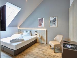 Postel nebo postele na pokoji v ubytování Hotel Balga Natur- und Bikehotel