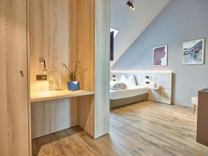 Postel nebo postele na pokoji v ubytování Hotel Balga Natur- und Bikehotel