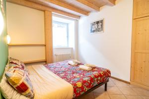 Posteľ alebo postele v izbe v ubytovaní Appartamento 1 Cogolo centro- Val di Pejo