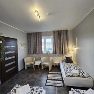 Llit o llits en una habitació de Guesthouse Kiljan