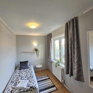 Llit o llits en una habitació de Guesthouse Kiljan