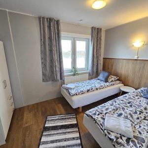 Llit o llits en una habitació de Guesthouse Kiljan