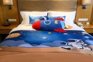 Letto o letti in una camera di Wyndham Jingzhou