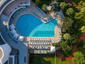 an overhead view of a pool at a resort at Swissotel Buyuk Efes Izmir in Izmir