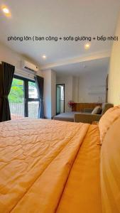 a bedroom with a large bed in a room at Sweet Home gần bãi sau in Vung Tau