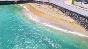 uma vista aérea para o oceano e uma praia em Guest room WES - Vacation STAY 49860v em Uruma