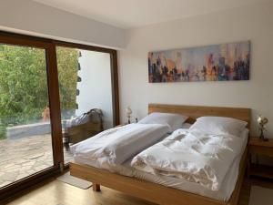 Llit o llits en una habitació de Schöne Ferienwohnung im Landhaus