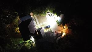an overhead view of a building at night at Caffeine Villa in Kaniyāmbetta