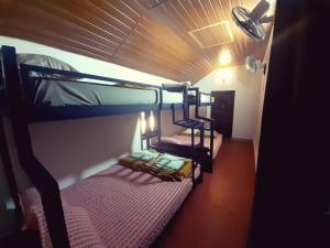 Postel nebo postele na pokoji v ubytování Caffeine Villa