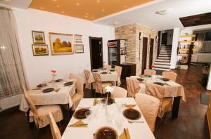 En restaurant eller et andet spisested på Casa Alexandra***