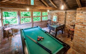an overhead view of a pool table in a room at Beautiful Home In Brestovac With Sauna, Wifi And Outdoor Swimming Pool in Novo Zvecevo
