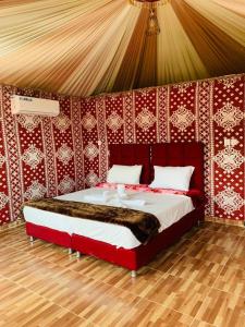 Postel nebo postele na pokoji v ubytování sand magic camp