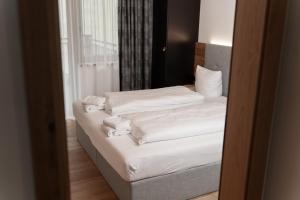 Posteľ alebo postele v izbe v ubytovaní A CASA Turmalin