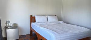 Postel nebo postele na pokoji v ubytování Pai sunrise camping resort