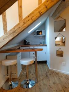 Η κουζίνα ή μικρή κουζίνα στο Charmant studio typique & cosy au Cœur de Caen