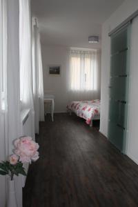 Postel nebo postele na pokoji v ubytování Bio's Appartment