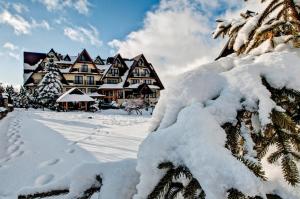 Folk Resort Domki i Apartamenty v zime