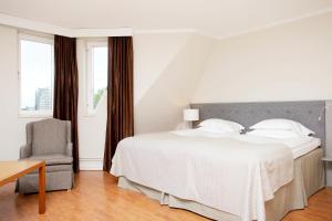 Postel nebo postele na pokoji v ubytování Hotel Bishops Arms Malmö