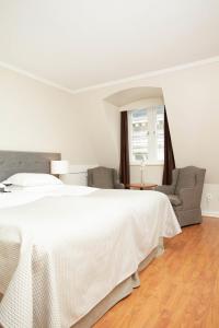 Postel nebo postele na pokoji v ubytování Hotel Bishops Arms Malmö