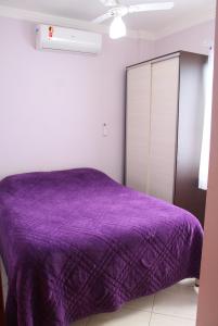 Katil atau katil-katil dalam bilik di Cantinho Aconchegante Morada do Sol +2 gambar