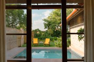 Surpura Bagh - A Luxury Boutique Resort内部或周边的泳池