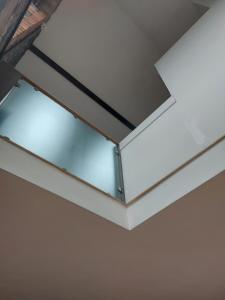 a skylight in the ceiling of a room at Converted factory loft apartment in Bristol